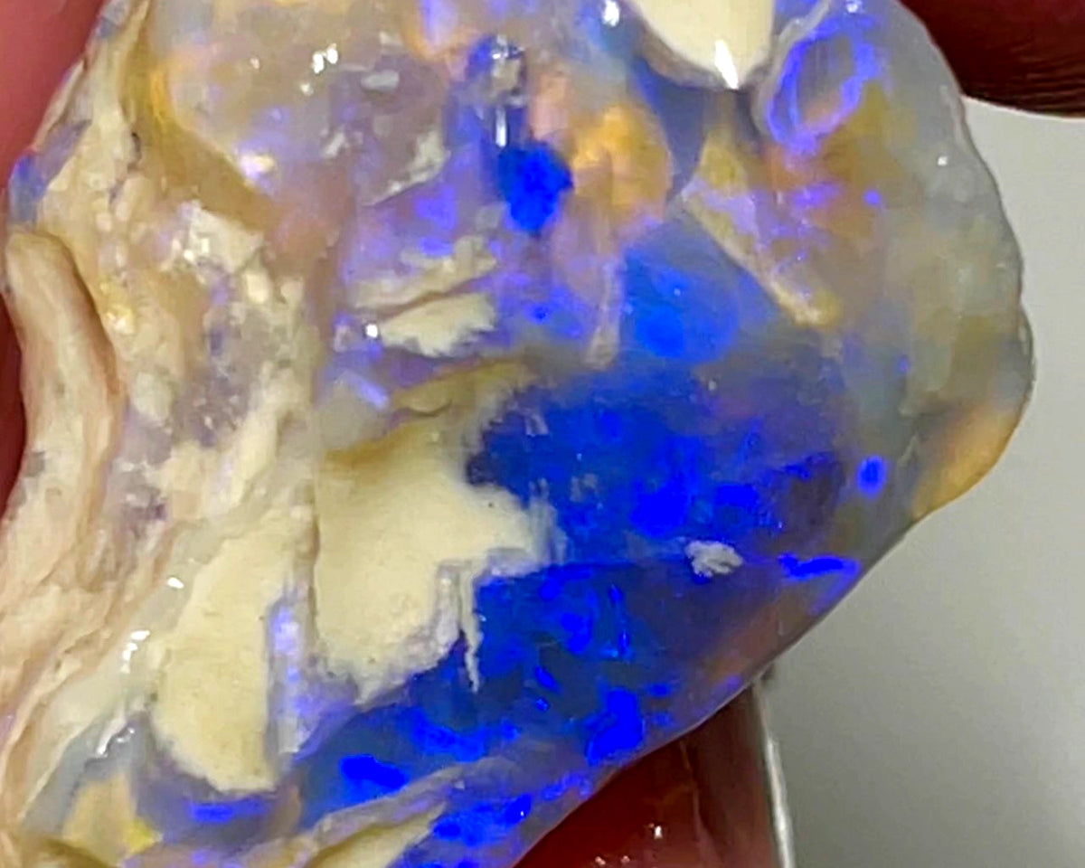 Lightning Ridge Rough Opal 28cts Dark Crystal Knobby with Bright bar with lots of blues 26x20x12mm WAD57