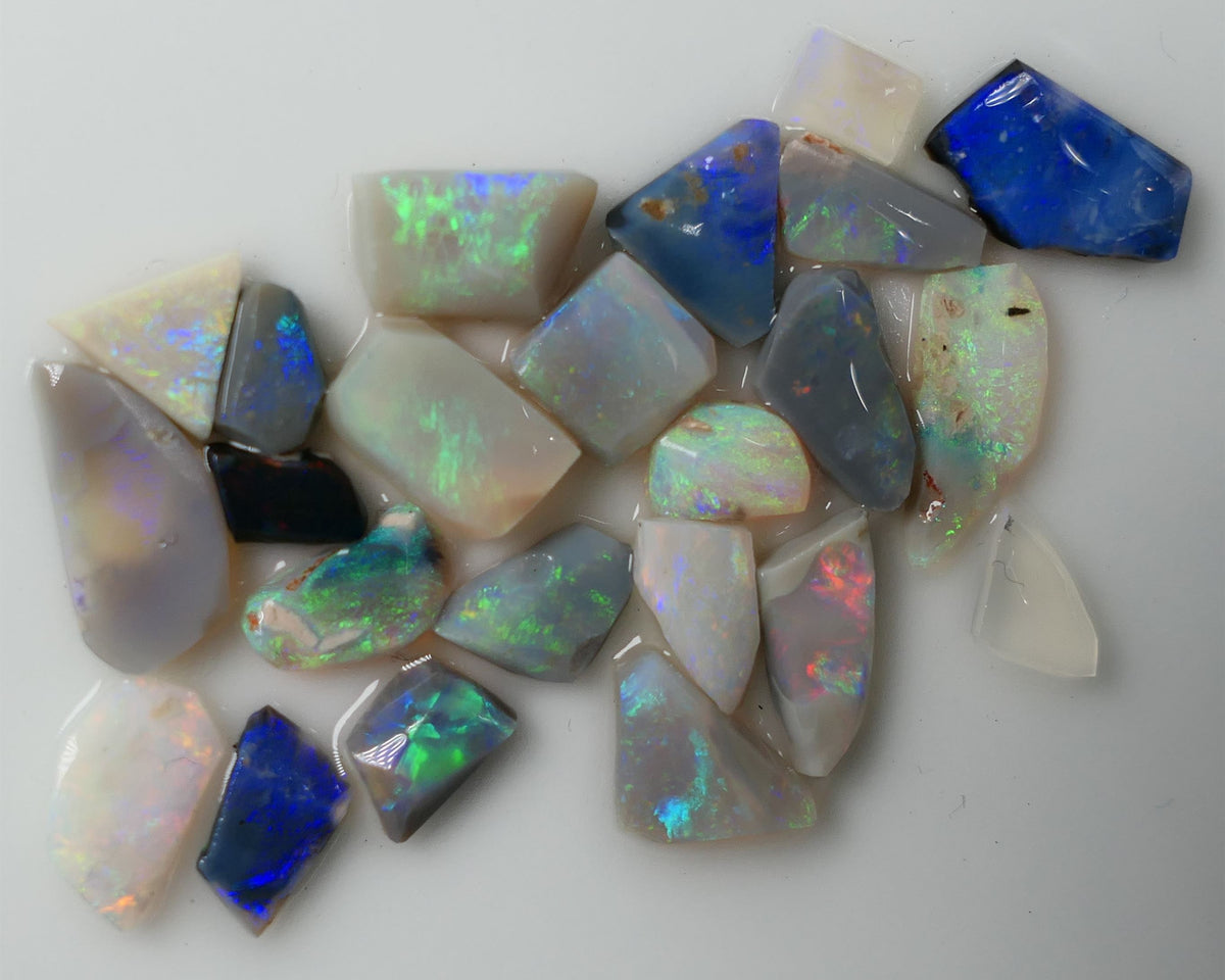 Lightning Ridge Rub Rough Parcel 14cts Stunning Little Gems all the colours in this parcel 12x6x2mm to 4x3x2mm 0634