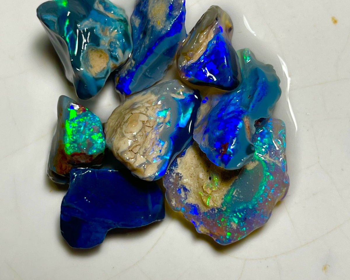 Very Bright Blue /Green dominant fires in this parcel of Black & Dark opal rough 35.75cts Lightning Ridge Material to cut 18x14x3mm to 10x8x7mm NSW184