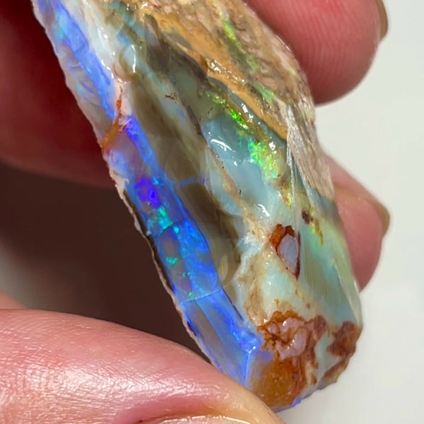 Huge Chucky Stacked Seam Opal rough 72.00cts Stunning Thick Blue Crystal bar sat on second bar of multifires on dark base 45x17x15.mm NEW922