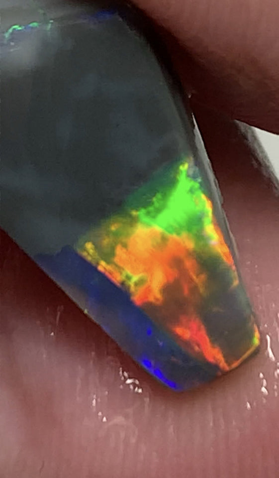 Australian Opal Gem Grade Single semi Black 3.4cts Rub/Rough Super bright Reds & Rainbow of Multifires Broad flash / Flagstone pattern 16x8x3mm WSJ40