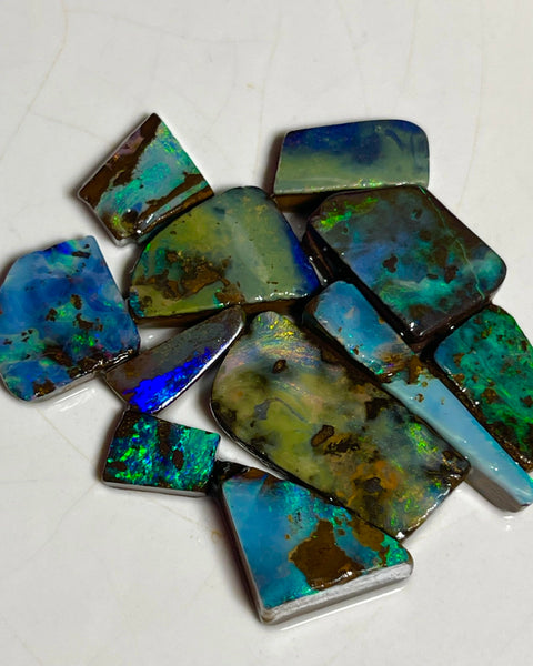 Winton Boulder opal Rubs/rough/preforms parcel 76.50cts Nice faces mostly greens/blues/Yellows 23x10x3 to 9x5x2mm NEW939
