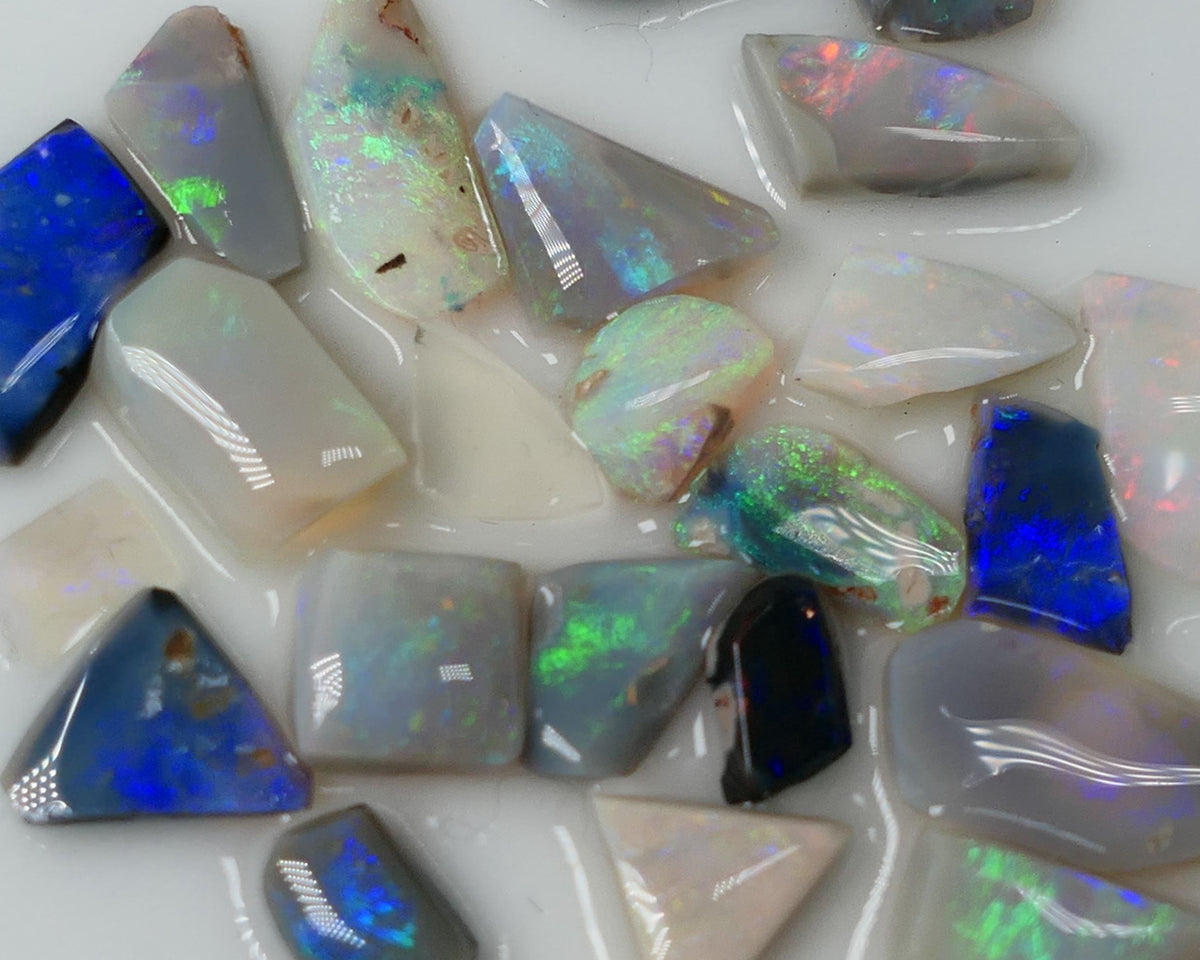 Lightning Ridge Rub Rough Parcel 14cts Stunning Little Gems all the colours in this parcel 12x6x2mm to 4x3x2mm 0634