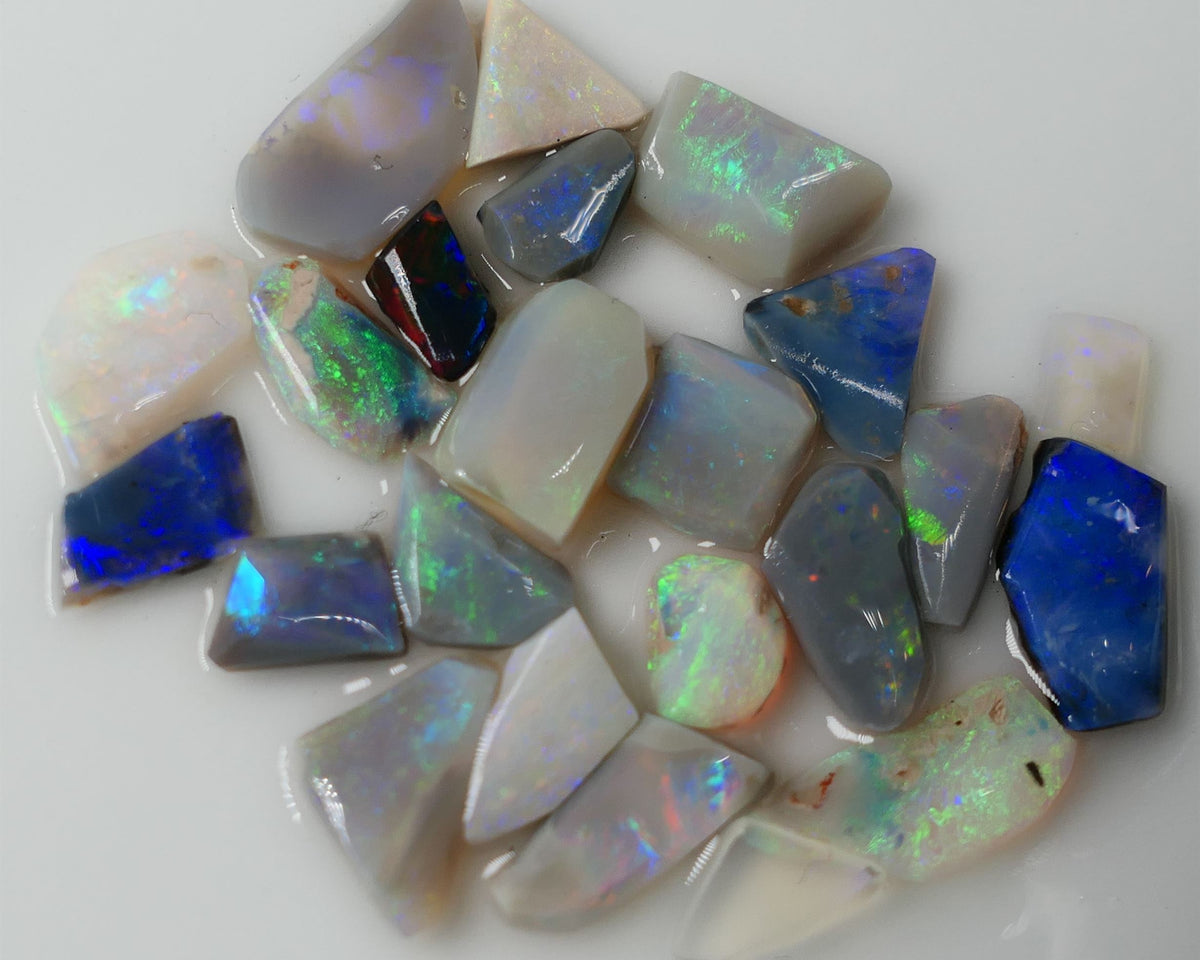 Lightning Ridge Rub Rough Parcel 14cts Stunning Little Gems all the colours in this parcel 12x6x2mm to 4x3x2mm 0634