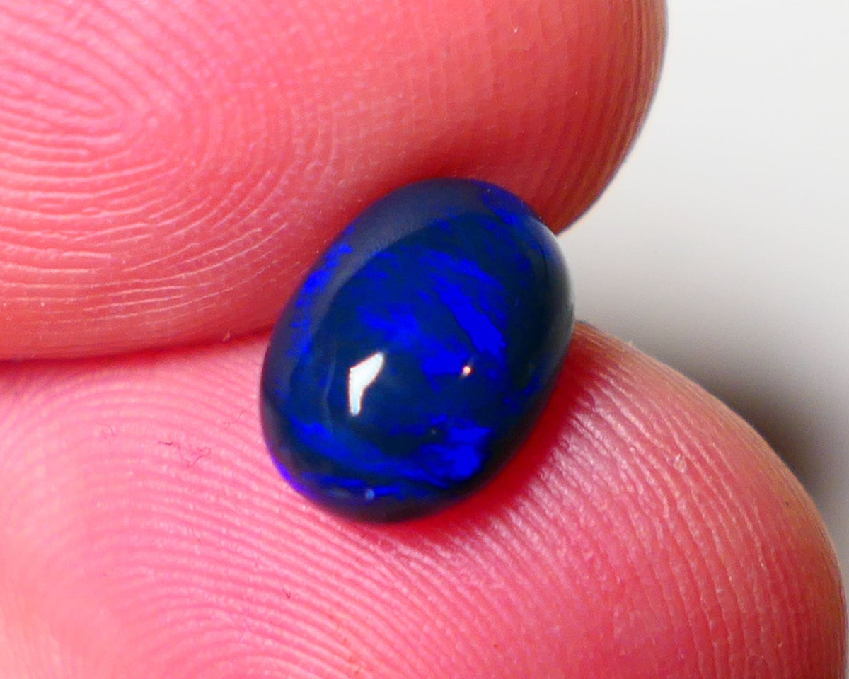 Lightning Ridge Black Crystal Opal Gemstone 2.40cts Gem Grade Mulga® N4 Black Body Tone High dome B6 Brightness Stunning Royal Blues 10x6x5mm UK07