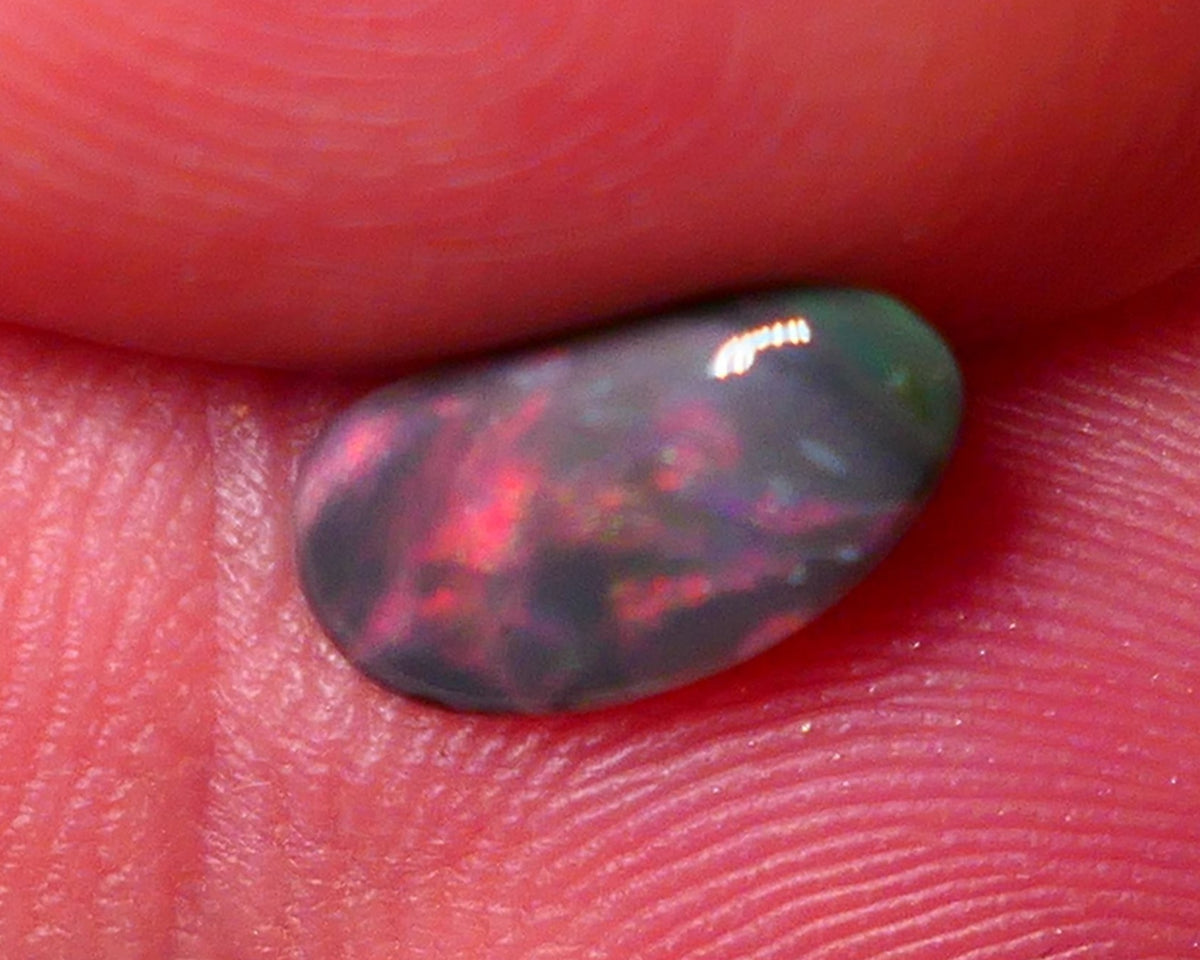 Lightning Ridge Red on Dark base Opal Gemstone 0.7cts Red dominant fires with Flat face 10x5x2mm 0652