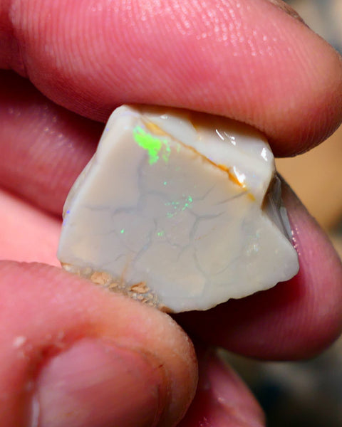 Lightning Ridge Opal Grey/Light base rub 22cts showing some Bright Green fires 20x18x10mm A1503