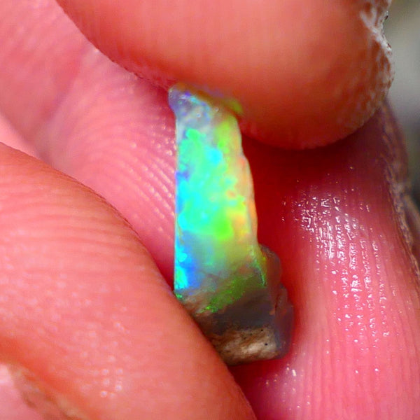 Small Candy to Cut Crystal on dark base 1.80cts Exotic bar with Vivid & Bright fires 14x5x4mm NS144