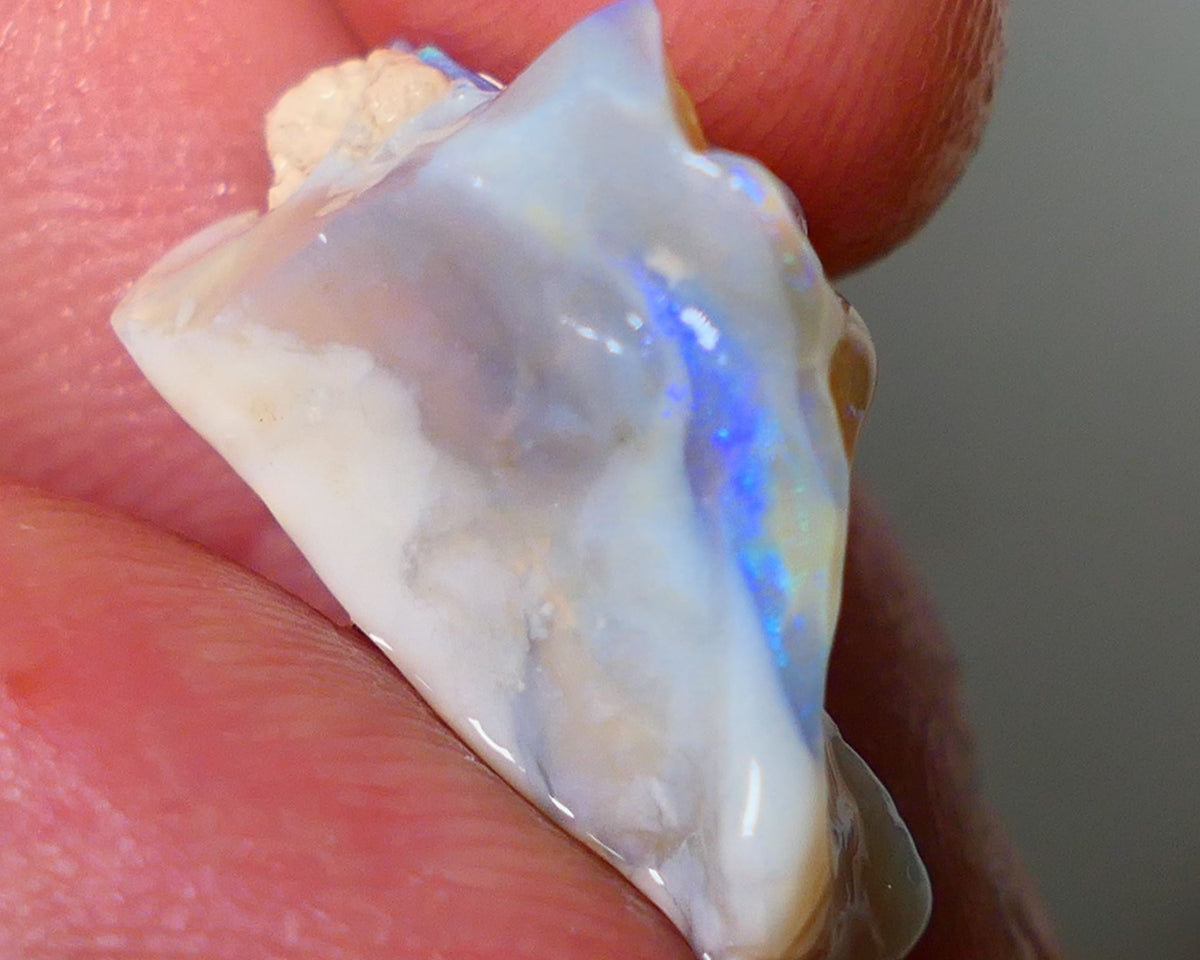 Lightning Ridge Rough Opal 11.25cts Light base Seam showing lots Nice blue colours 21x14x9mm NS180