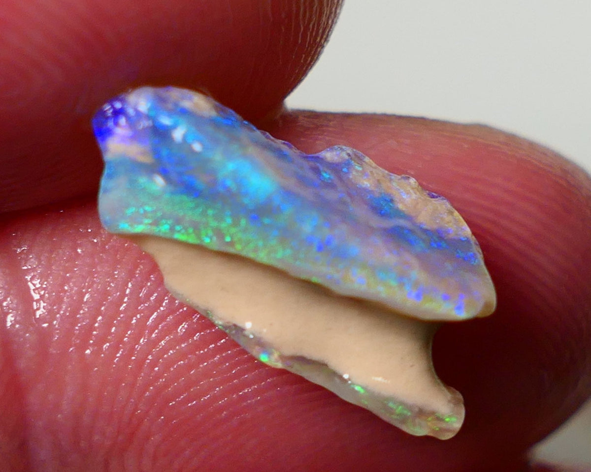 Small Candy to Cut Crystal on dark base seam formation 3.50cts Exotic bar with Bright fires 17x7x6mm NS176