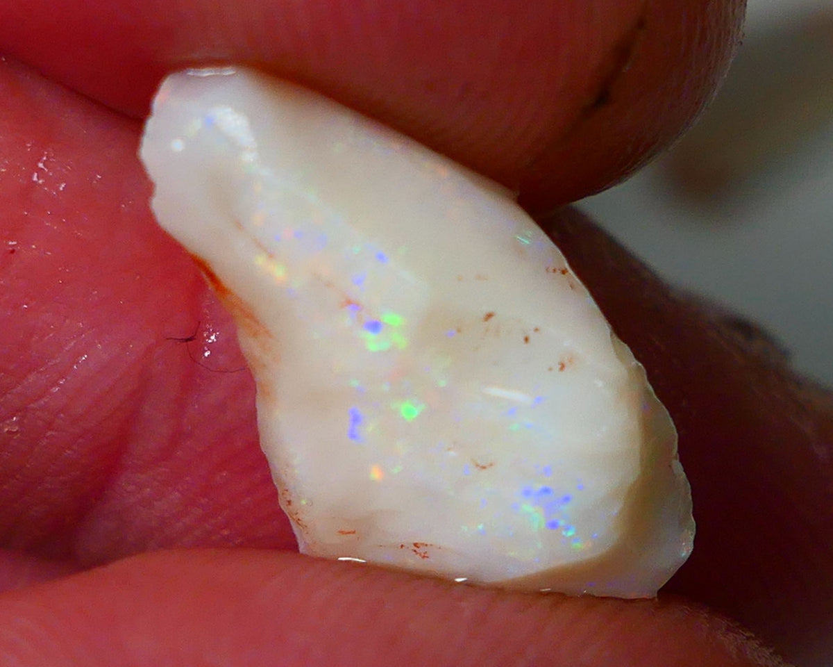 Lightning Ridge Rough Opal 4.25cts Light base Seam showing Yellow/Orange Dominant M.colours to cut 19x11x5mm NS334