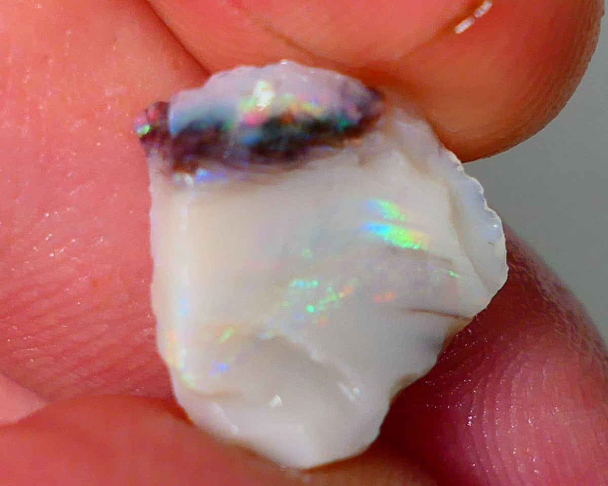 Lightning Ridge Rough Opal 4.15cts Light base Seam showing Green / BLue Dominant M.colours 14x13x4mm NS332