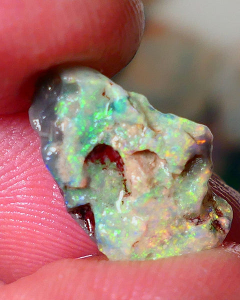 Lightning Ridge Gamble opal rough showing nice bright colours  3.50cts 18x11x4mm ALP111