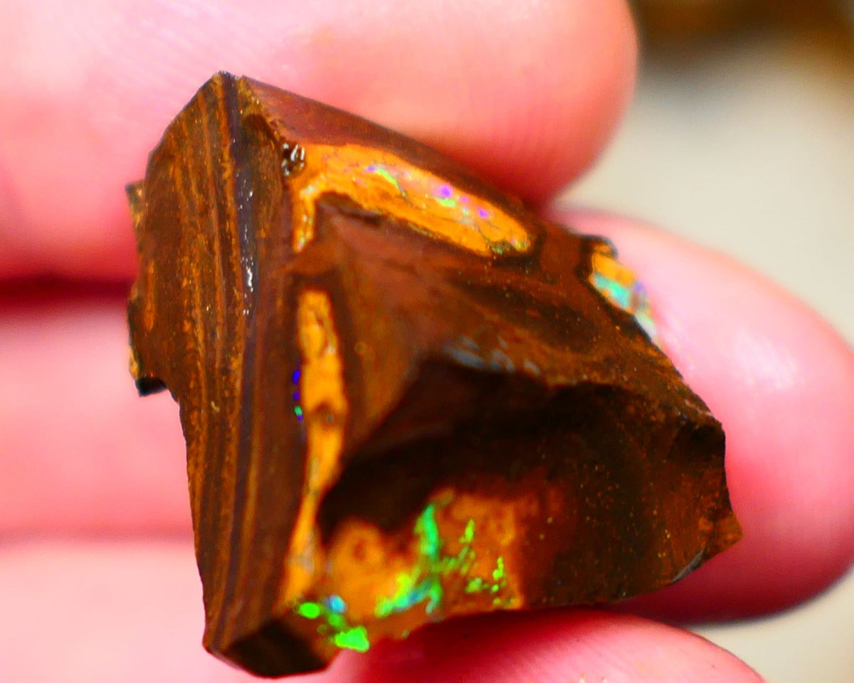 Winton Gem Boulder opal to cut 57.00cts Wonderful Bright & Vibrant Multifires showing on 4 sides time to take the cap off who wants it ? Auction91