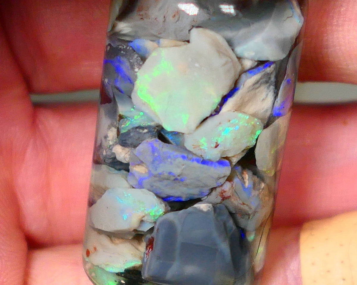 Lightning Ridge Rough Opal Small seams 51cts Dark base Multicolours 14mm to chip size range Auction73