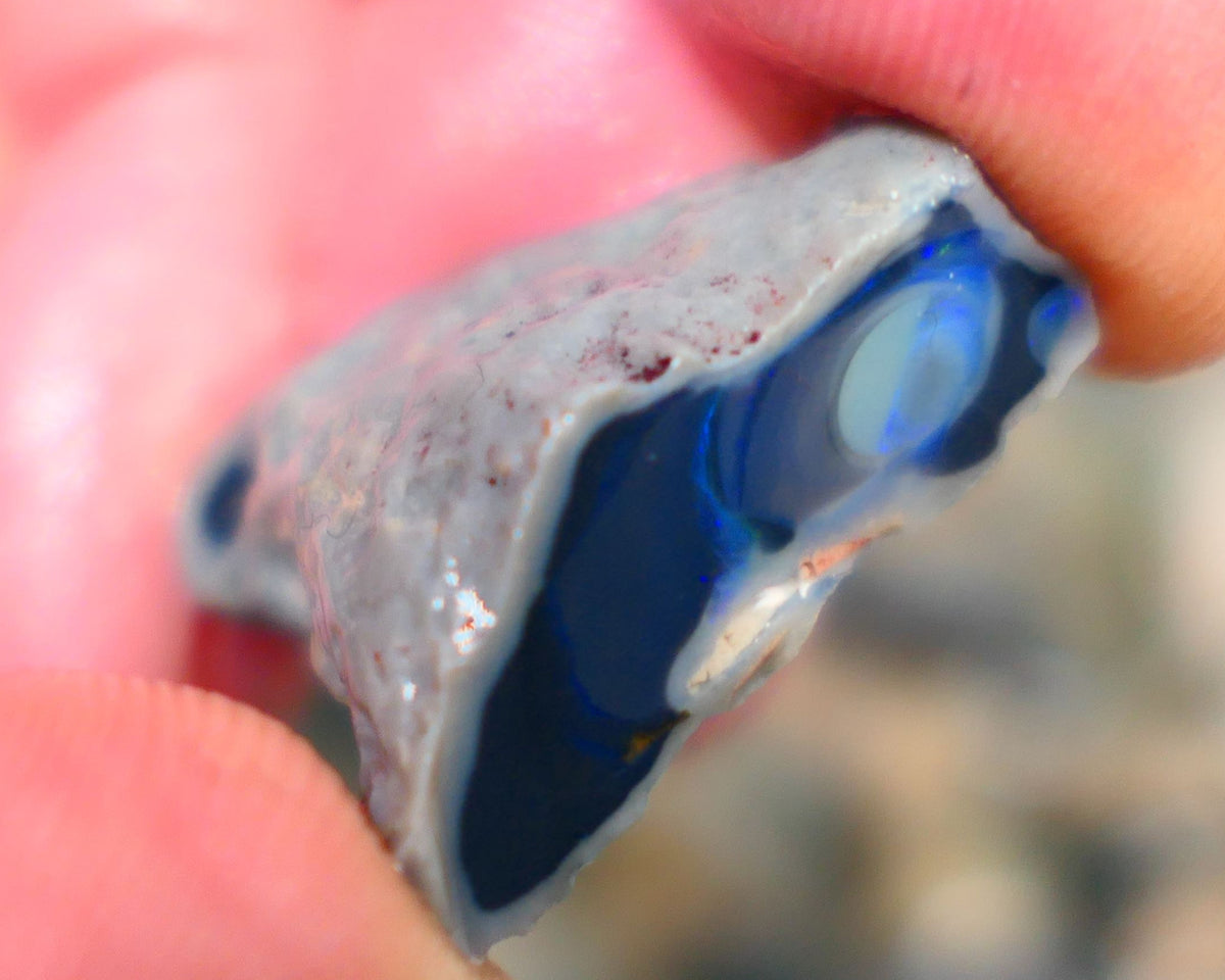 Lightning Ridge Rough Opal half of a black centered knobby split 23.00cts Showing Blue fires Maybe a Picture stone? 24x20x9mm Auction106