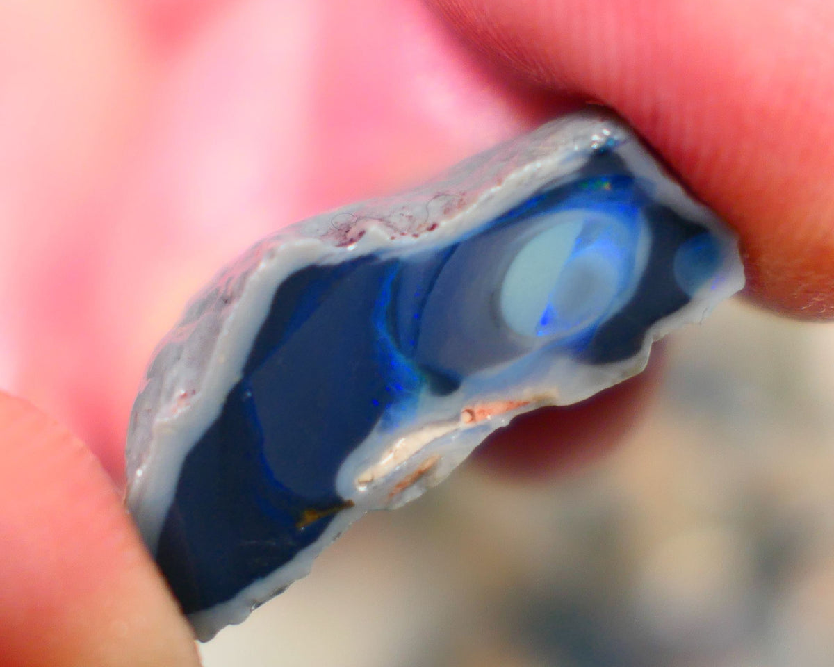 Lightning Ridge Rough Opal half of a black centered knobby split 23.00cts Showing Blue fires Maybe a Picture stone? 24x20x9mm Auction106