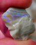 Mintabie Grey base seam opal rough 9.75cts Multiple bars carrying blues fires to explore Sold as Gamble 21x14x5mm Auciton190