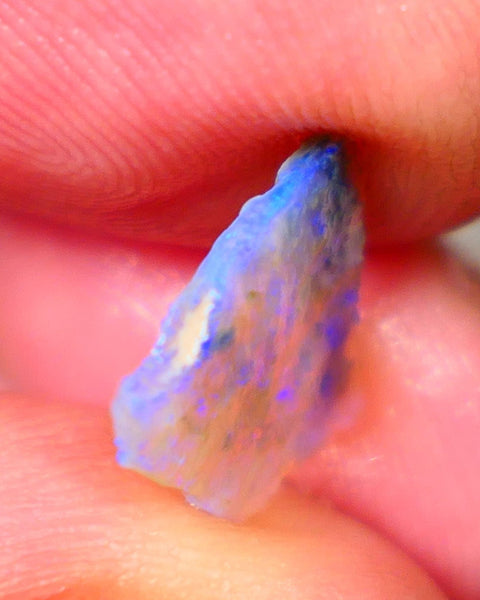 Lightning Ridge Dark base Crystal Seam opal 1.30cts Note this is thin So suit inlay/doublet etc Nice Bright Blue fires to work with 12x11x1.5mm GMB-025