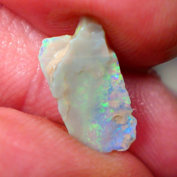 Lightning Ridge Dark base Seam opal 1.95cts Note this is thin So suit inlay/doublet etc Nice Yellow/Blue/Green fires to work with 15x7x3mm GMB-021