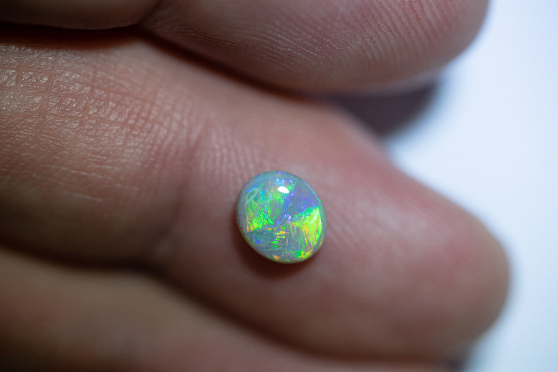 Crystal Opal Gemstone 0.95cts N7 Body Tone B2 Brightness  Broadflash & Brush Stroke pattern with TOP Multi colour fires WSA041021C