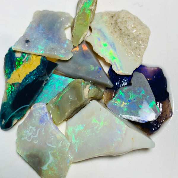 Australian Opal Rubs Parcel Black, Semi Black & Crystal Plate of colour from the Miners Bench® 44cts Bright FIRES / MULTIFIRES to faces 21x13x9mm to 9x9x3mm WSP90