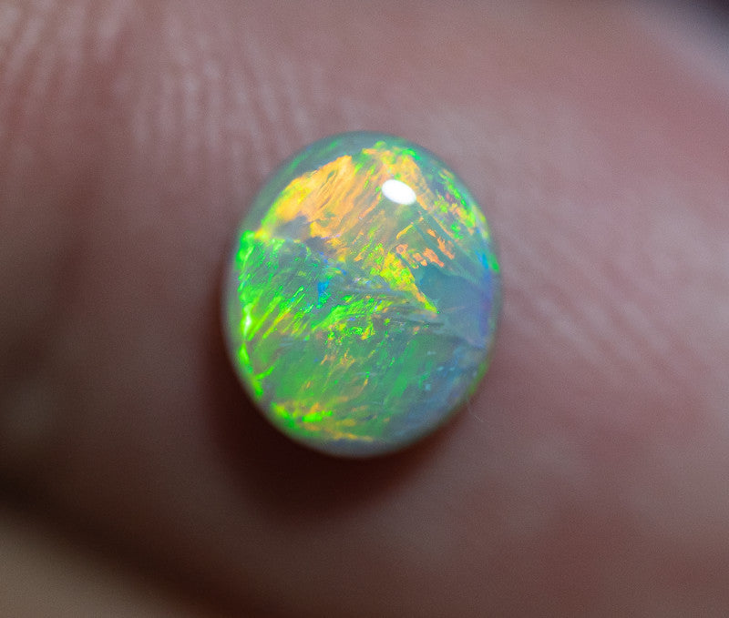 Crystal Opal Gemstone 0.95cts N7 Body Tone B2 Brightness  Broadflash & Brush Stroke pattern with TOP Multi colour fires WSA041021C
